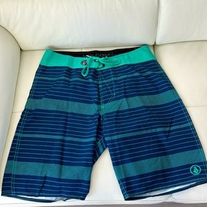 Volcom Board Shorts navy blue w/ turquoise/aqua green stripes Sz 33 EUC